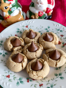 These Almond Butter Thumbprint Cookies are an almondy version of the classic peanut butter blossom cookies. They are made with some healthier ingredients, making them a great addition to your Christmas cookie lineup!